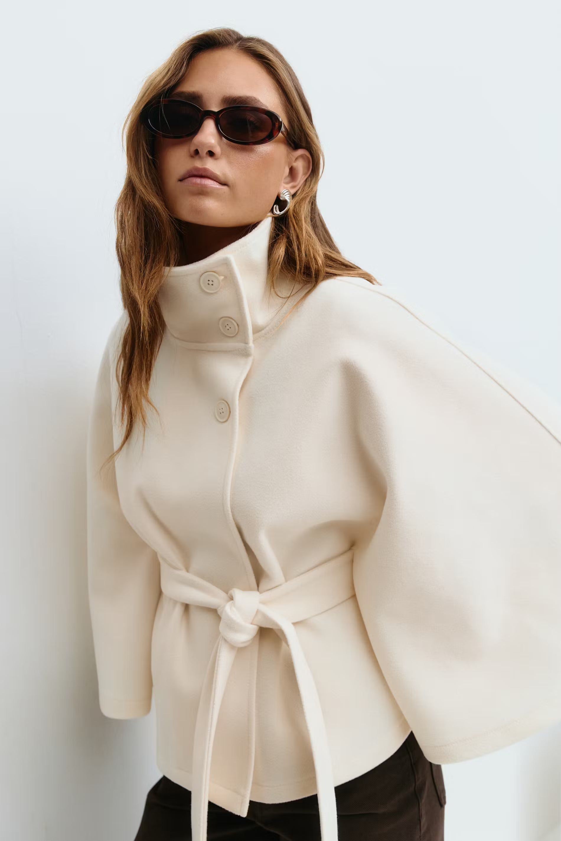 Clara | Cape jacket with sleeves, high collar, and belt